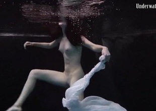 Balletic underwater swimming about a teen knockout